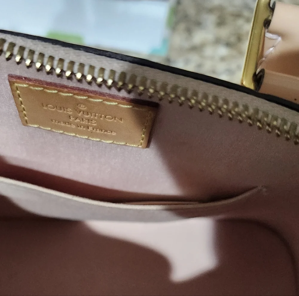 Louis Vuitton Pink Mini Bag with Structured Design and Metal Hardware - Picture 10 of 15